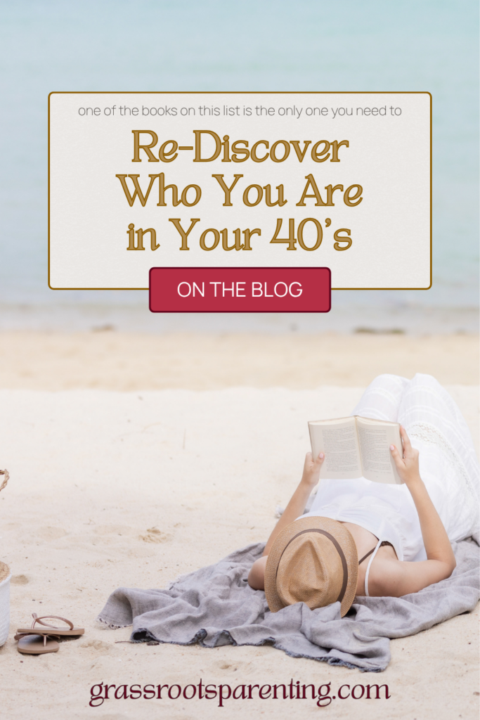 Image of an attractive mature woman lying on her back on a beach blanket by the beach reading a book - suggesting the concept of finding yourself in middle age