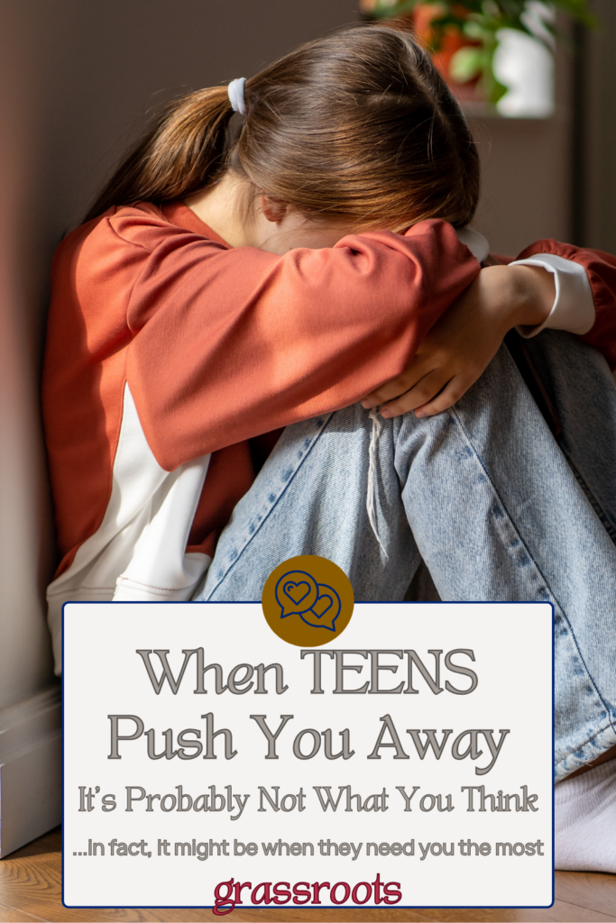 Pin image of teen girl alone with her head down in her arms - concept of a rupture in her relationship with mom and the need to repair so daughter experiences feelings of emotional safety